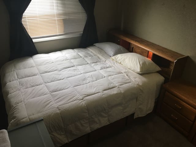 Comfortable Queen Bed with Blackout curtains