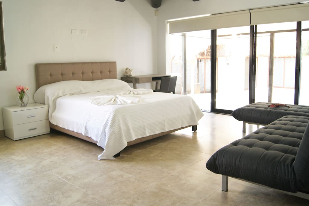 Large comfortable bed and futon for up to 4 people