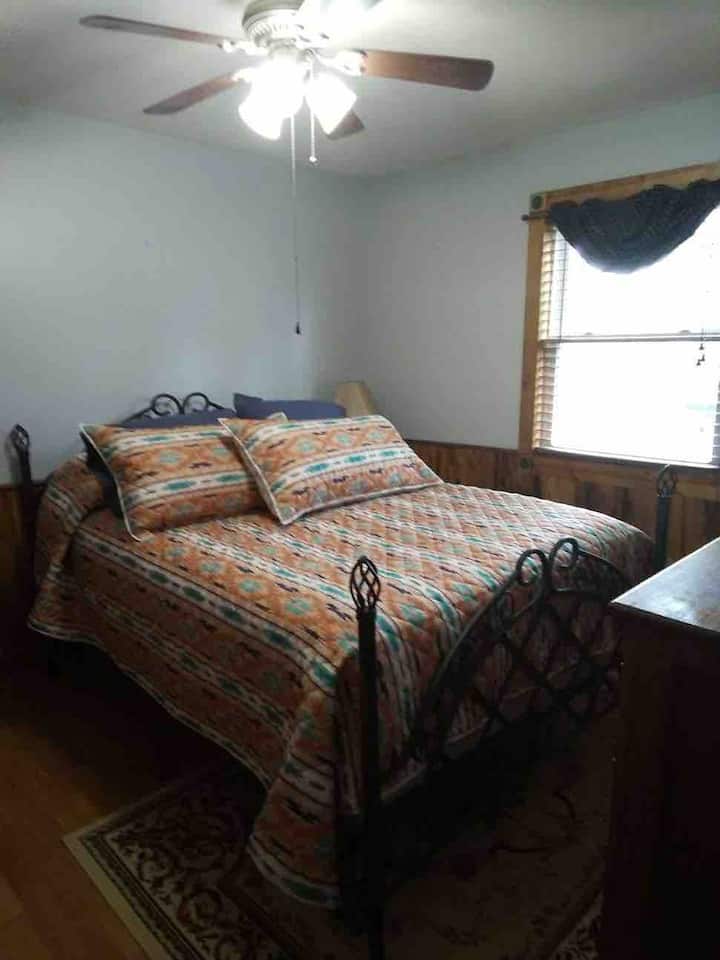 Master bedroom with ceiling fan