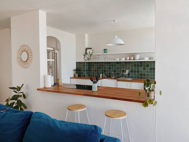 cute, sun-soaked apartment above the sea gallery image 2