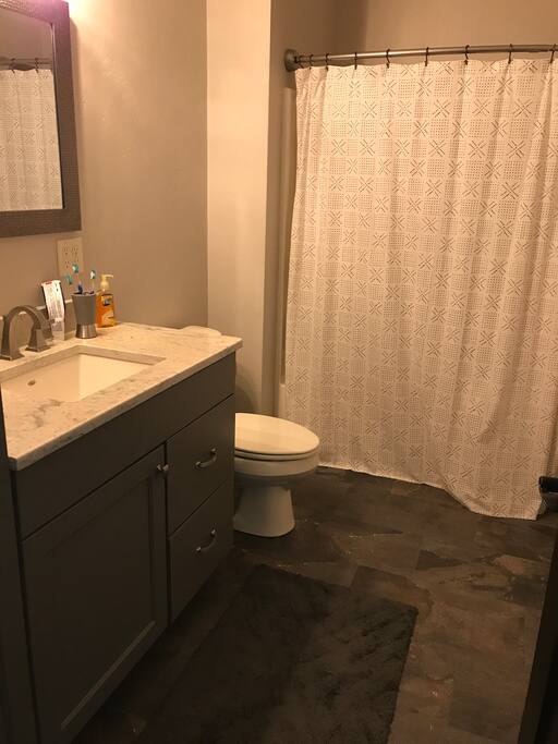 Bathroom off of bedroom 1 and 2