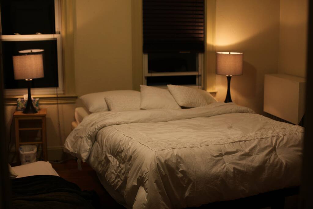 Shot of main bed and a bit of the extra futon (for parties of 2 or more)