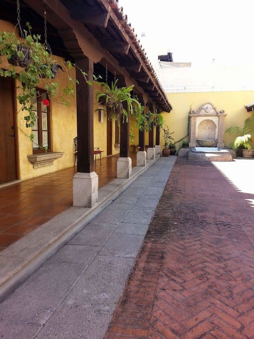This is the courtyard leading to the front door of the townhouse. It is inside the complex.