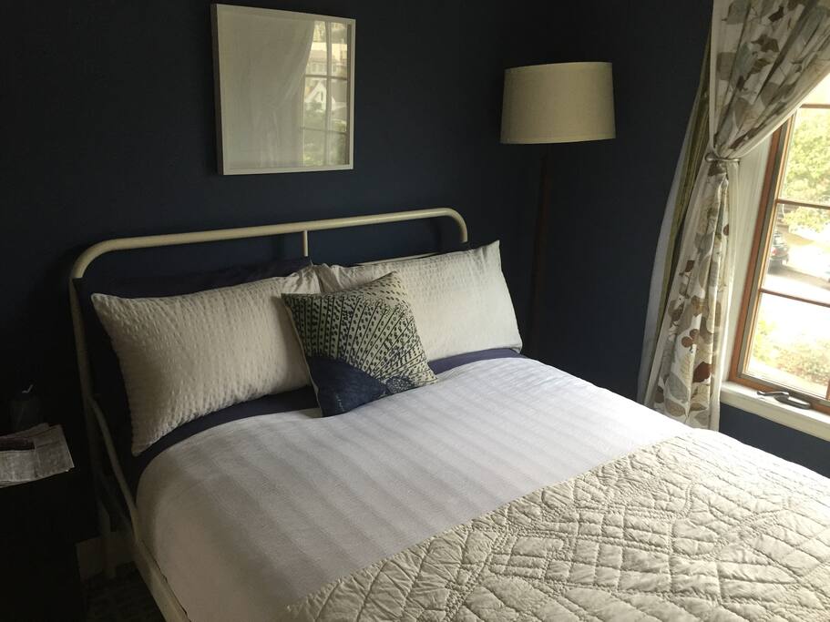 Nice light, closet, dresser and chest of drawers.