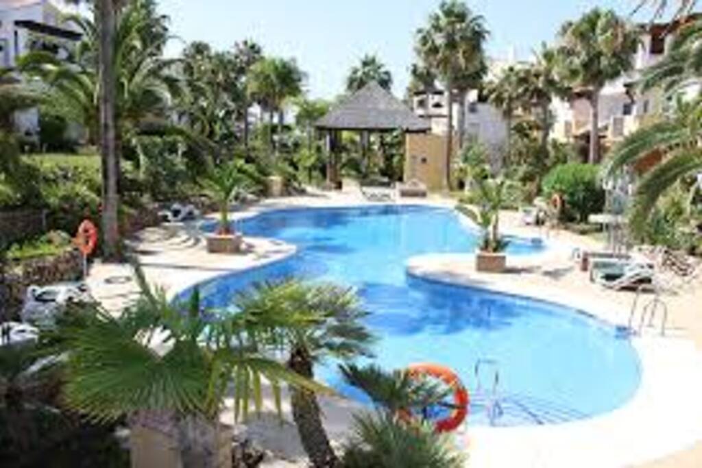 Piscina, jardín común