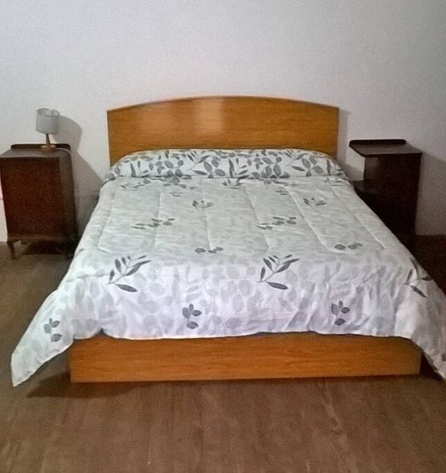 Guest double sized and super comfortable bed.