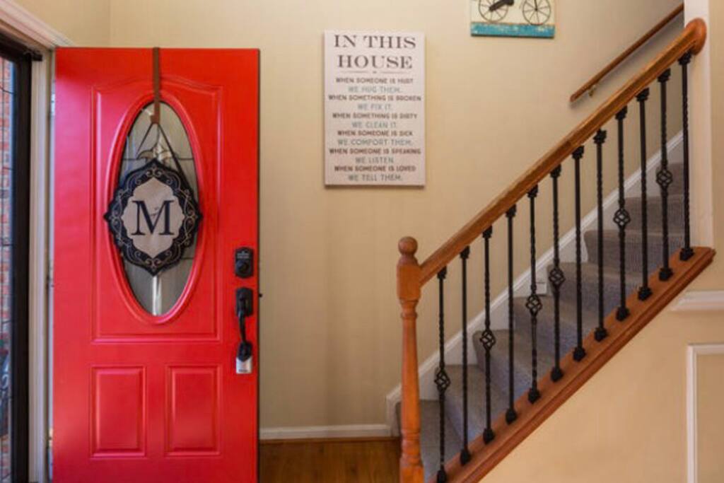 The front door is equipped with a keyless door lock to ease coming and going. Just up the steps is where you'll find the cozy bedrooms and full bathroom. The motion sensored lights lining the steps and throughout our home make night navigation safer and easier. This area of our home is equipped w/an electronic surveillance device.