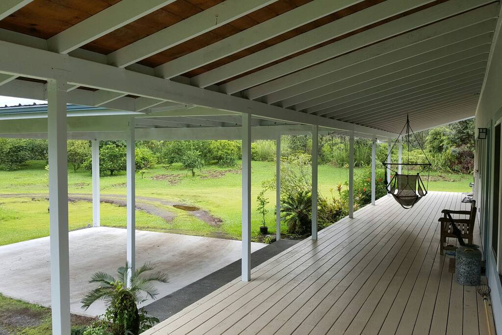 Carport, lanai with swing and hammocks