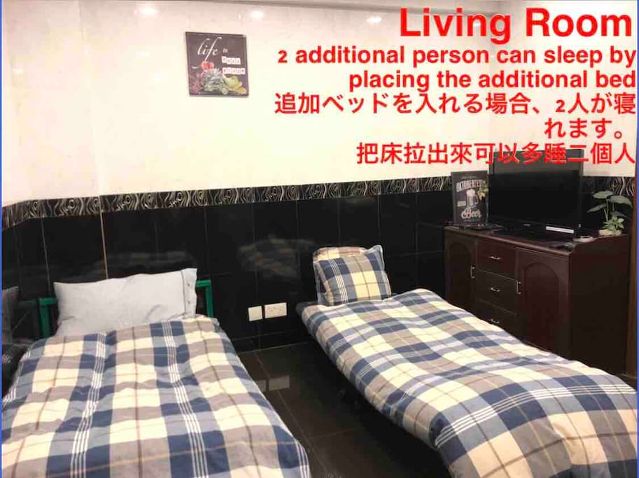 This is the living room area. We have provided a folding bed to accommodate additional guest. A total of 2 guests can sleep in the living room by arranging the folding bed like this..