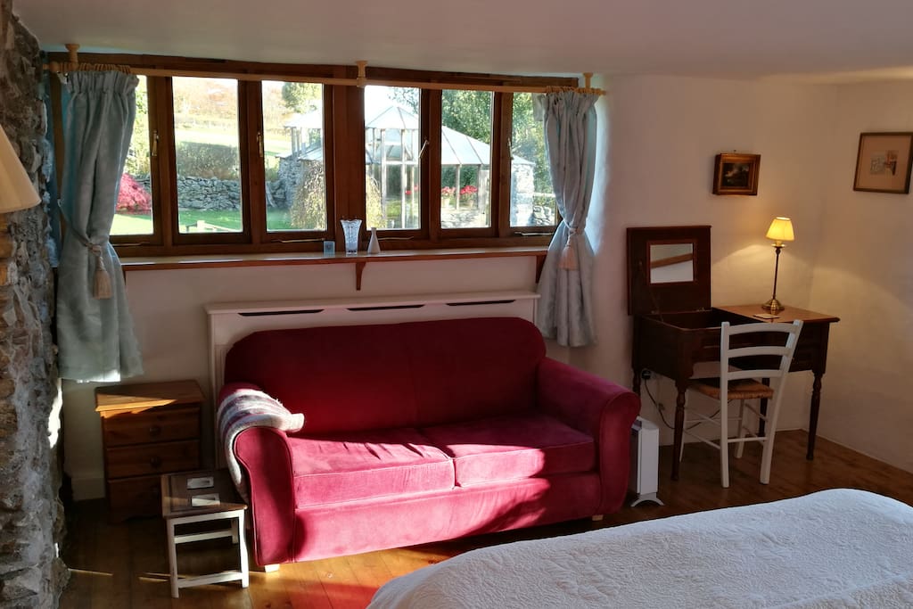 Large bed sitting room with view