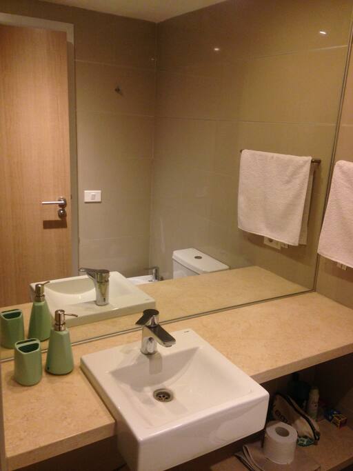 Bathroom includes shower, toilet, bidet and handwash