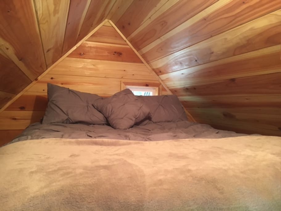Bed on mezzanine floor