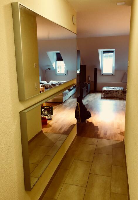 The hallway leading form the bedroom to the living room / kitchen area