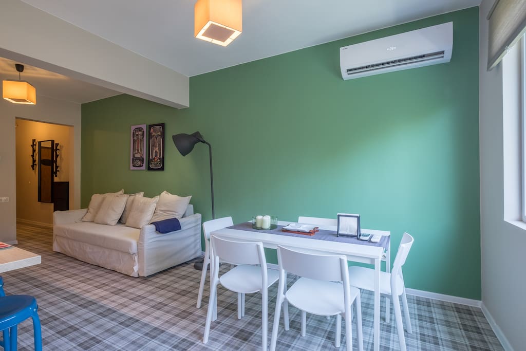 Dining area. Up on the wall is Air Conditioner.