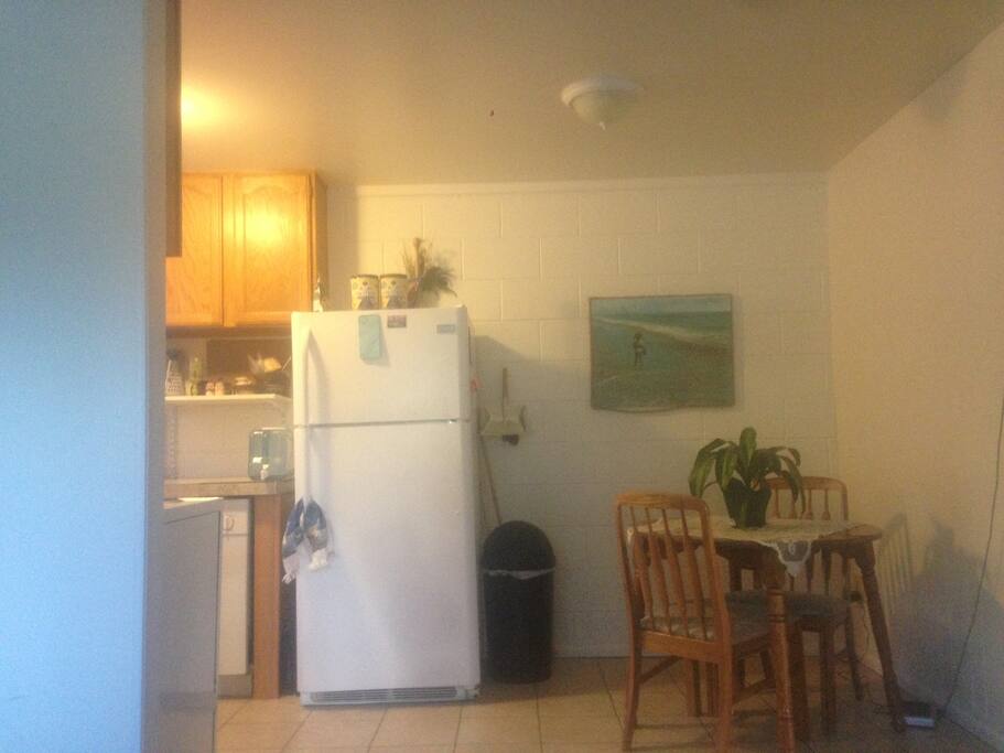 Adorable little dining area. Plenty of space in the fridge and freezer to keep your food.