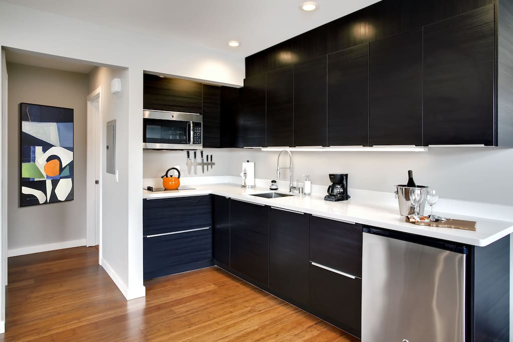 Modern kitchen with dishwasher, fridge