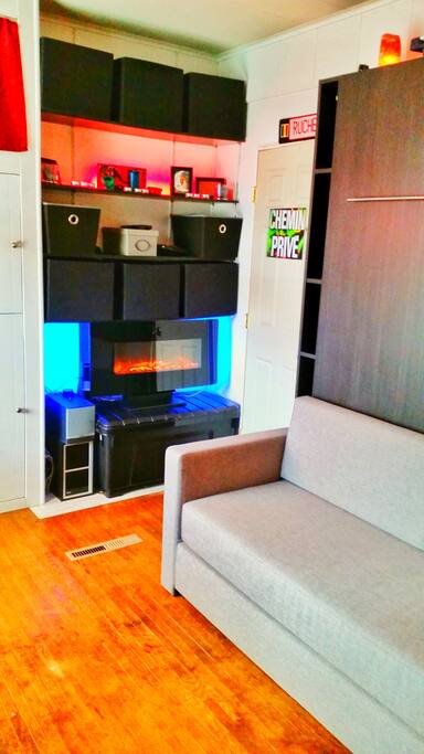 Studio room. Bed in the UP position. Love seat is comfy!