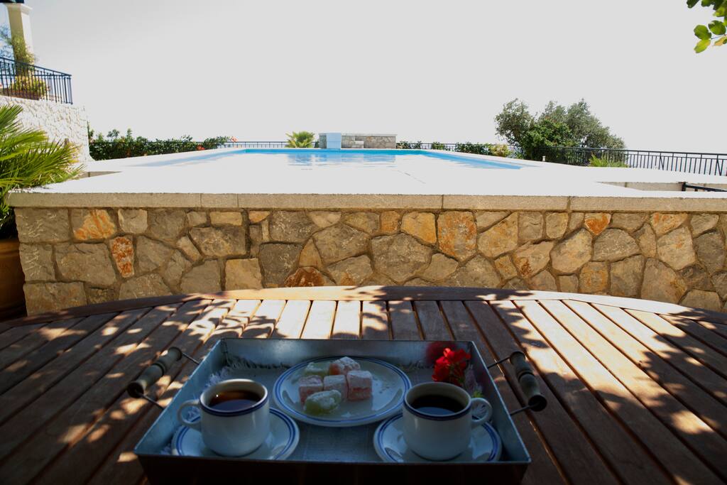 Shaded sitting area by the pool.