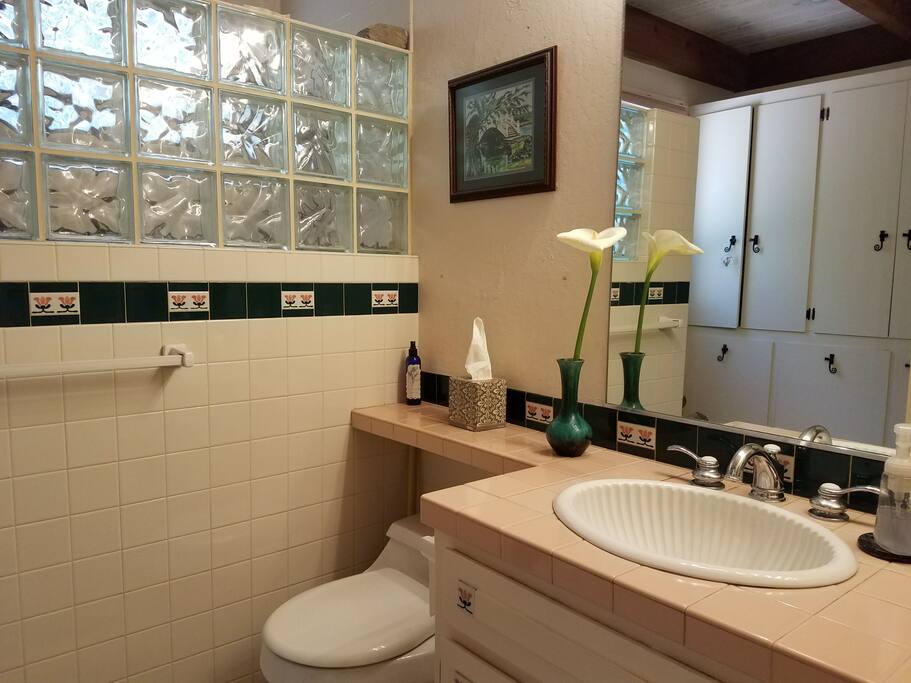 Full bathroom with shower is shared and down the hall.
