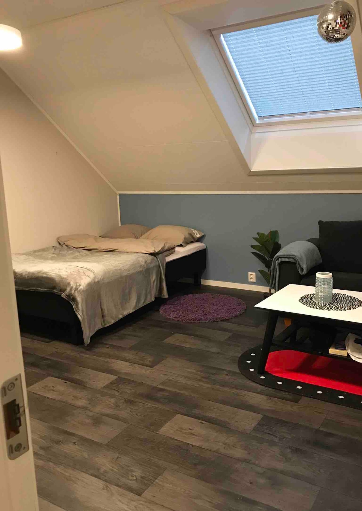 Bed 120*200.
2 seater sofa and table on the right. There is plenty of space for both 1 and 2  extra beds if desired.