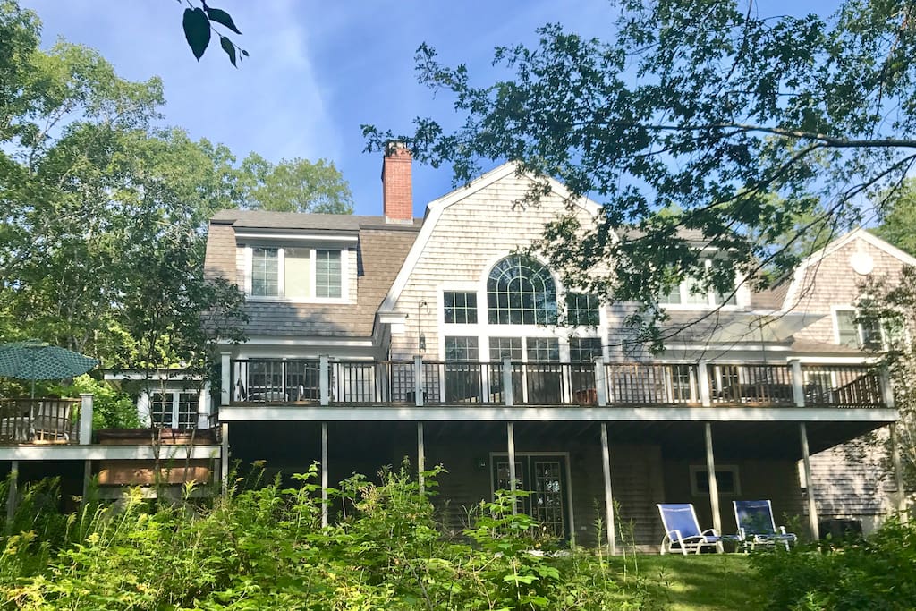 Large deck on the back of the house facing the water