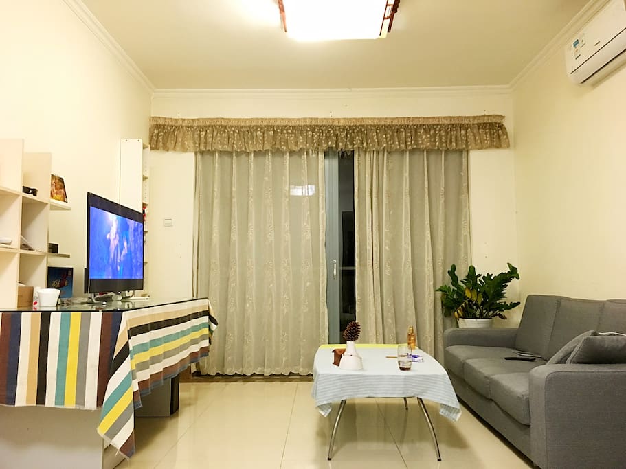 Sofa & Wifi connected TV set with various film resources.