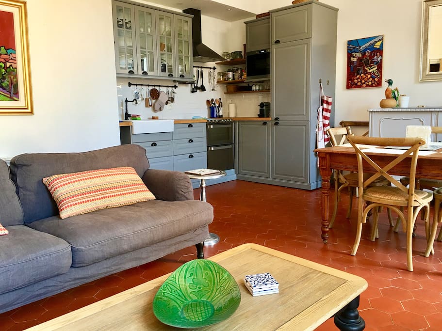 The Salon / Kitchen / Dining area is open concept and relaxing. Great for sharing delicious finds from your day's travels.