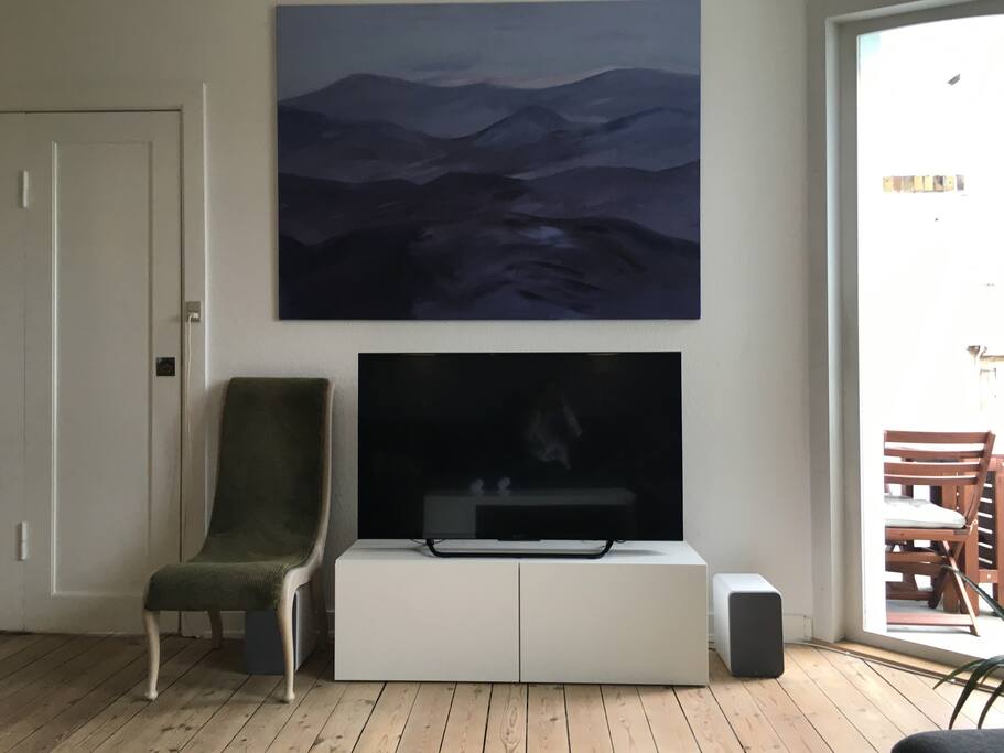 Living room - Android TV with many apps like Netflix, and cable TV