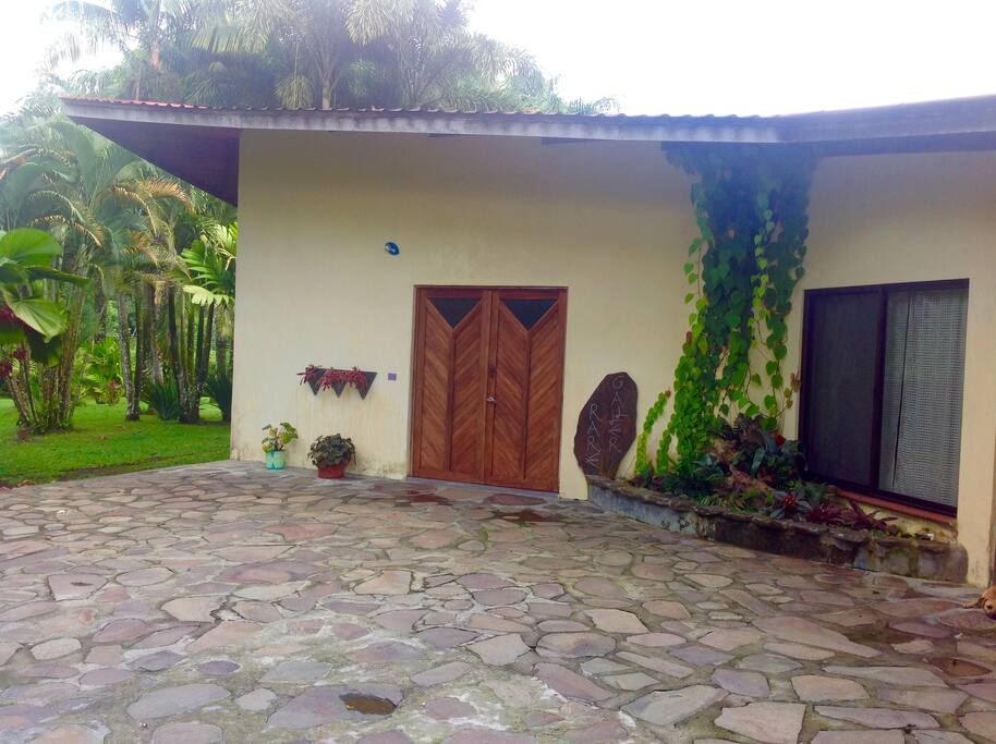 View to the house from the front gate, ,a lot of parking space, and very easy access from the road to the house.