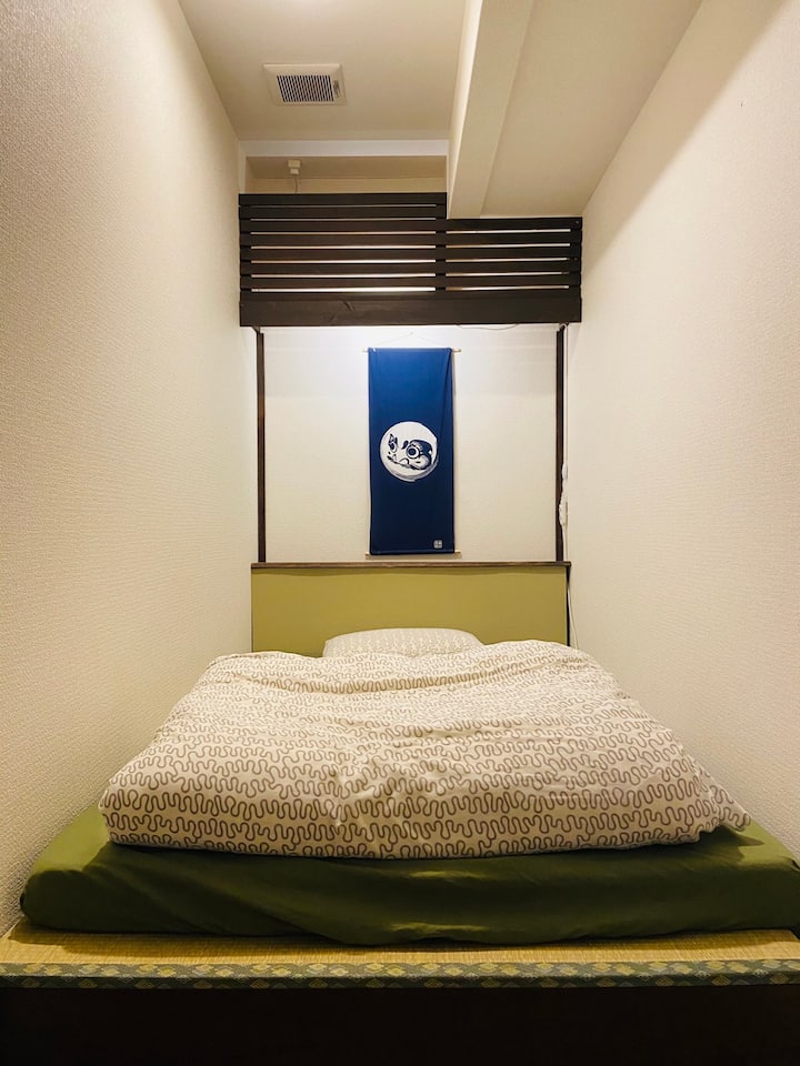 2F - Small private room for one person with low table, chair, mirror, bedside lamp, air con. It's small & basic but got all you need. Perfect for travelers who want more privacy in an affordable price.