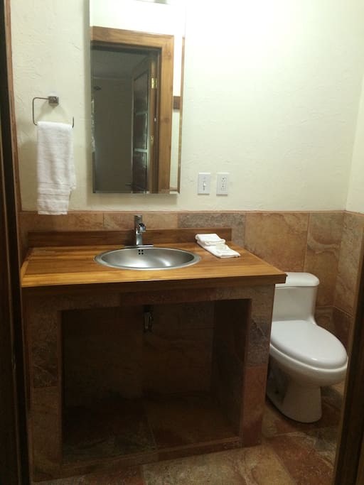 Handcrafted wood counter tops with stainless steel finishings