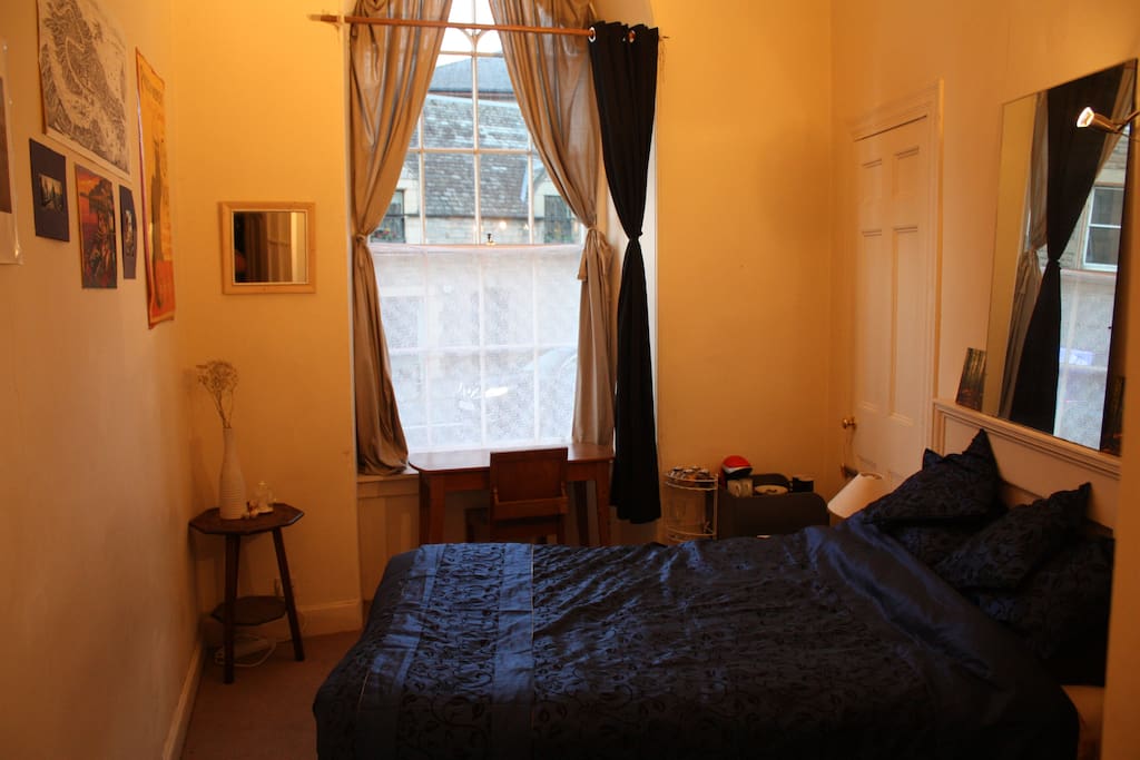 View of bedroom and coffee machine
