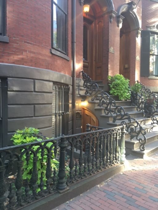 Separate entrance to the condo under the stoop
