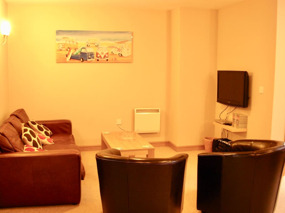 Lounge, with large screen tv & dvd player