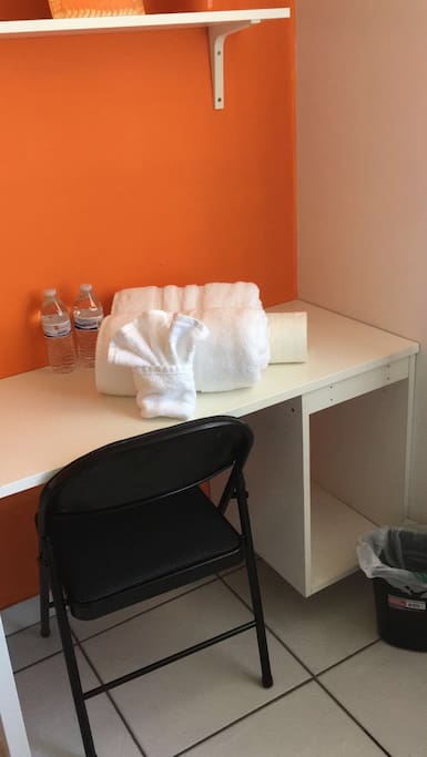 desk, towell, welcome water bottle