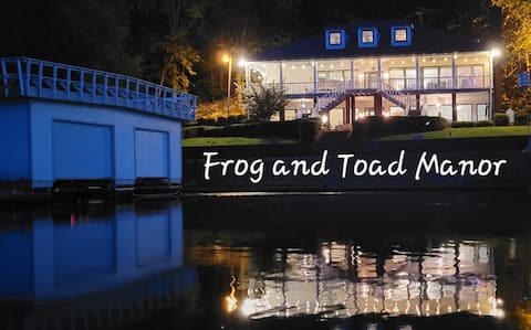 Spacious lake home on water with huge porch & dock