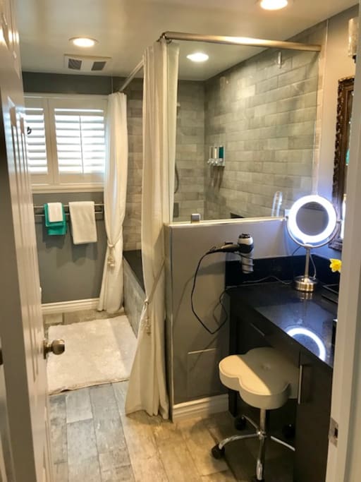 Have a seat while you blow dry or style your hair or apply your makeup at the vanity sink area.