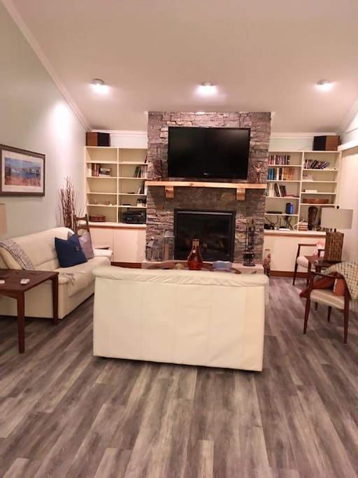 Very large gas fireplace and 60 inch satellite TV. Watch a movie and take the chill out of the room with a remote control fire place