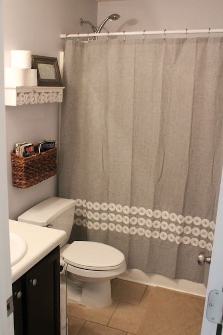 Guest bathroom with basic toiletries and fresh towels