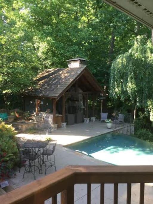 Pool cabana with bathroom, outdoor shower, wetbar and fireplace