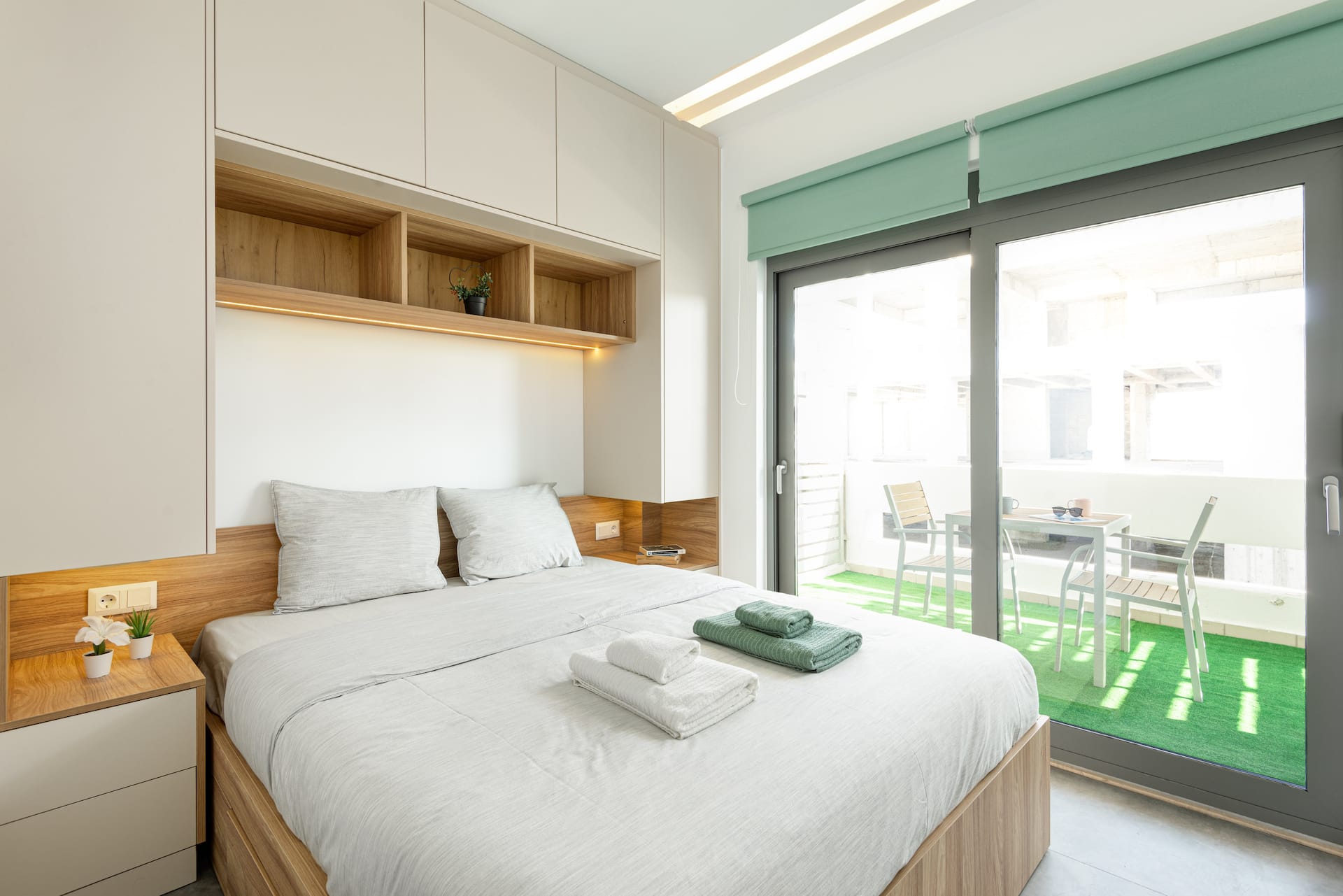 Majestic balcony studio overlooking city's heart