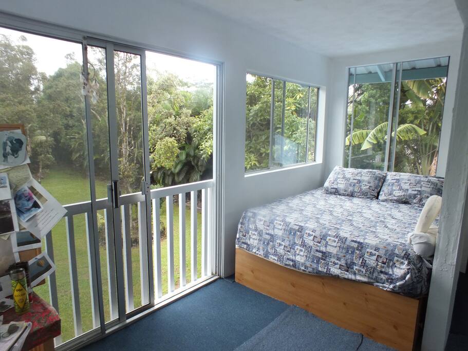 California queen size Bed looking out to paradise.