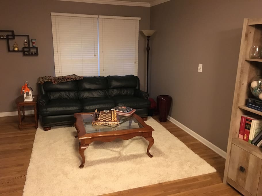 Living room with leather couch.