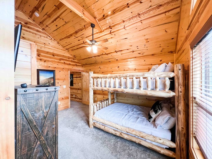 Bedroom 3: queen/queen-size bunk beds with ensuite full bath upstairs. Kids will LOVE this room!  Room includes a smart TV with HDMI hookups for their Nintendo Switch! 