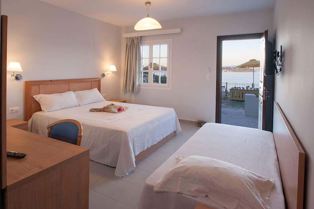 . From this unique room you do admire Adonis red roses and the sea takes many different poses .