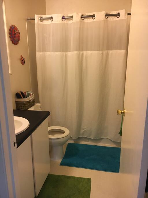 Bathroom has tub and shower