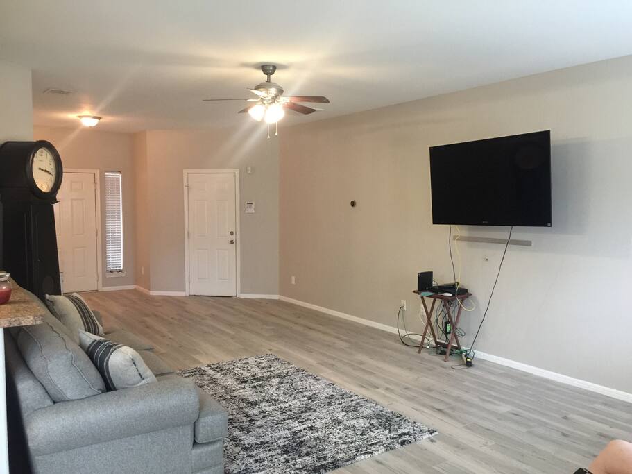 Picture of living room with a fresh coat of paint applied in Dec.2016, prior to adding entertainment system hooks up to the wall.