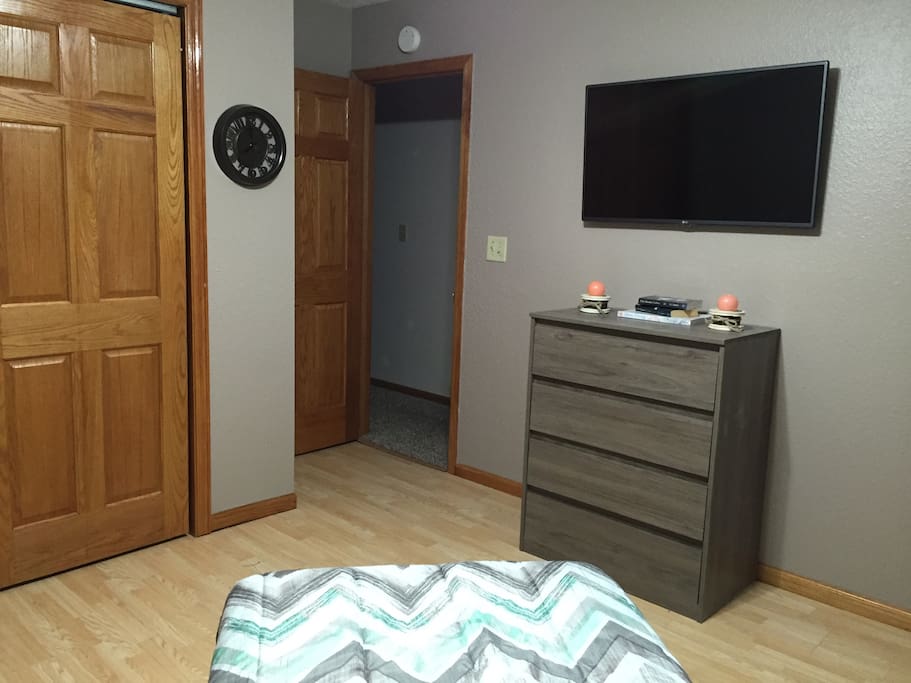Space to hang clothes and dresser for clothing.