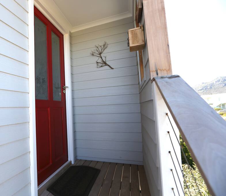 Up the stairs where the Red Door will welcome you