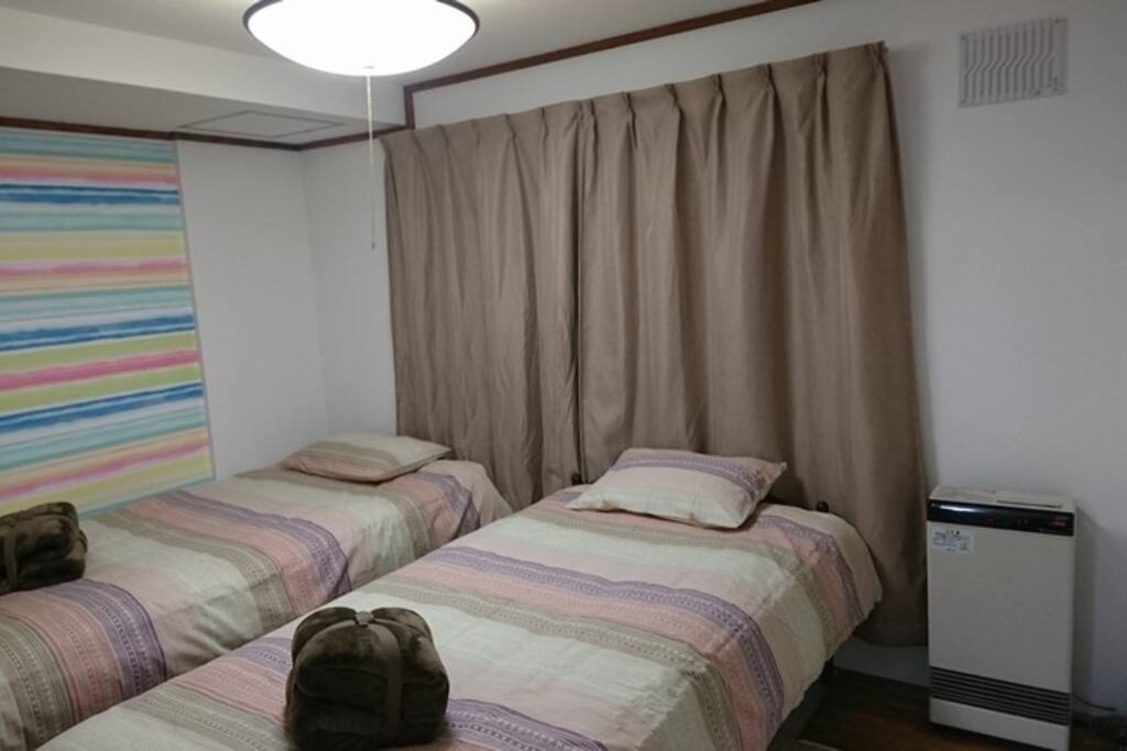 Bedroom with two single beds